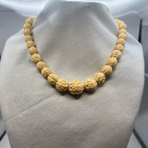 Vintage Carved either Celluloid or Bone beaded necklace